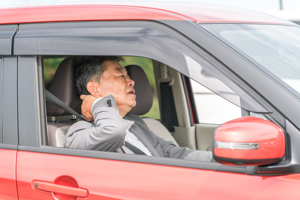 体の痛みと自動車運転 イメージ